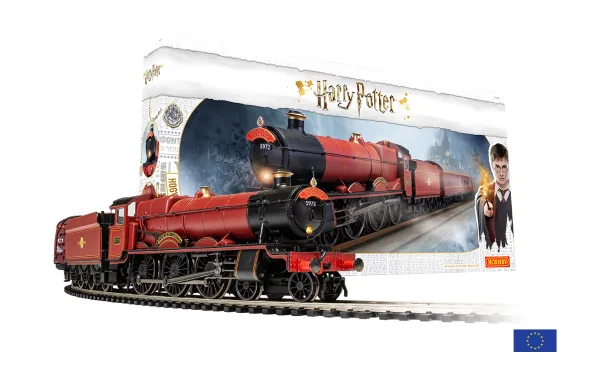 Hogwarts Express' Train Set - Euro 2 pin plug <p>Are you ready to attend Hogwarts School of Witchcraft and Wizardry this year?</p><p><br></p><p>The best way to get there is with the Hornby Hogwarts Express Train Set!</p><p><br></p><p>In brilliant Hogwarts red and containing a DCC Ready 5972 locomotive with working headlight