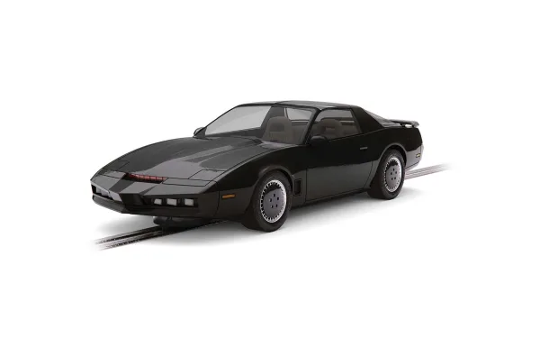 Knight Rider - KITT <p>Knight Industries Two Thousand' won't mean much to anyone but mention KITT to any kid from the 1980s and they will instantly know what you are talking about! This Scalextric slot car replica of KITT comes with a working red strobe light