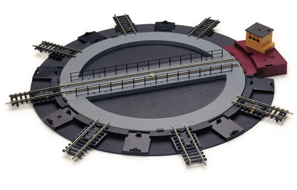 Motorised Turntable The turntable is designed to operate with the Standard Train Controller R965. Drive the locomotive onto the turntable